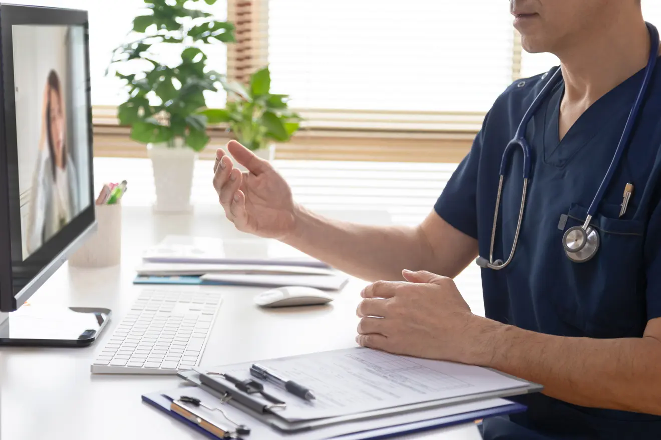 A patient in a video consultation with a practitioner